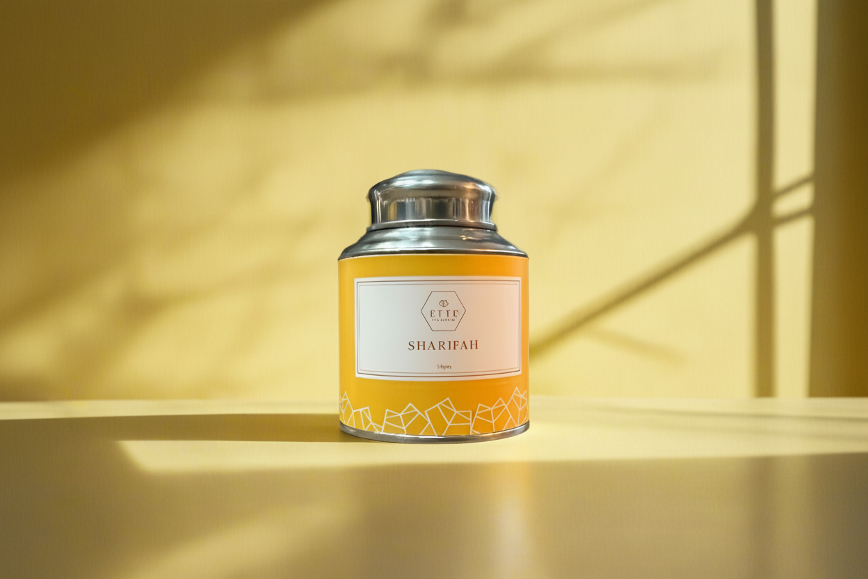 Tea canister labeled 'Shahrah' on a wooden surface with a yellow background