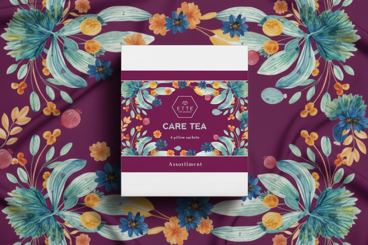 Care Tea package with floral design on a purple fabric background