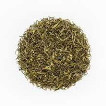 Close-up of dried green tea leaves