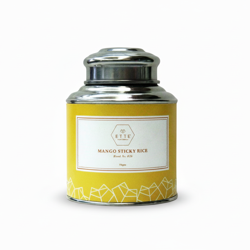 Yellow canister with a silver lid on a white background