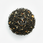 Tea ball with dried fruits and leaves on a white background, featuring the Ette Tea Company logo.