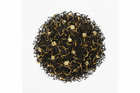 Black tea leaves with gold buds on a white background