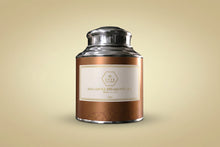 Tea canister with a label on a white background
