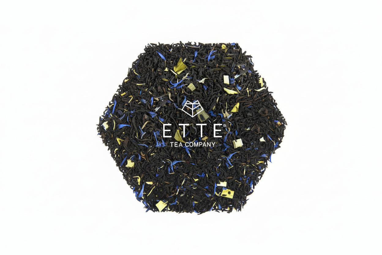 Hexagonal container of tea with visible brand name 'ETTE Tea Company' on a white background