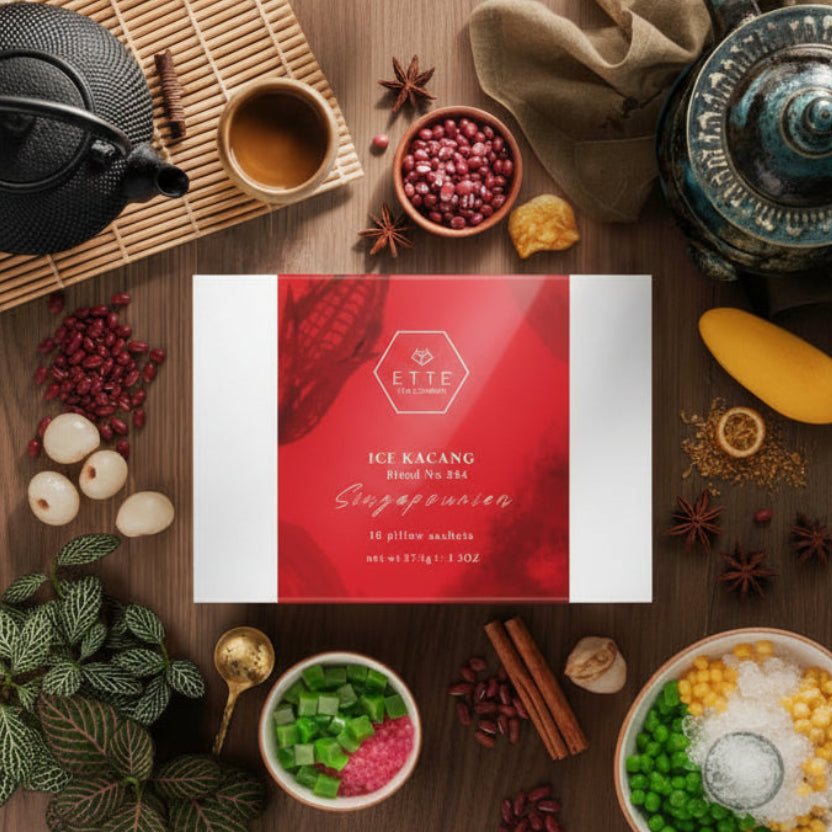 Red box labeled 'ETTE' surrounded by various food items on a wooden surface